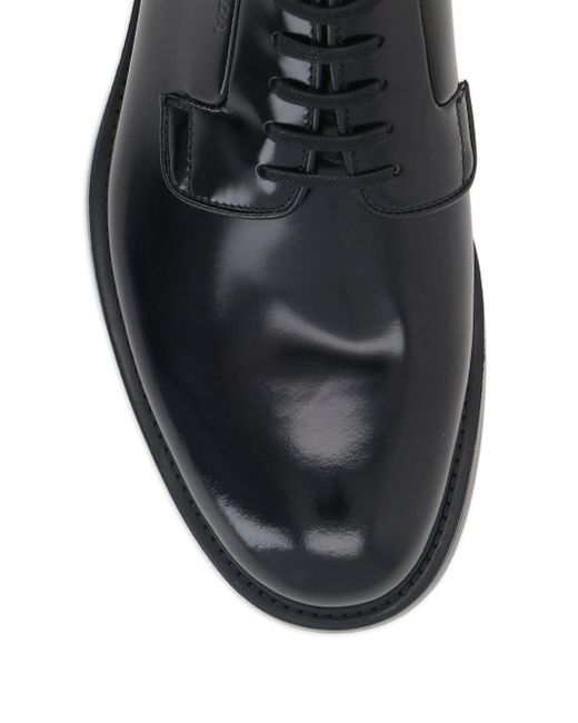 Zapatos derby con acabado pulido Prada de hombre de color Black