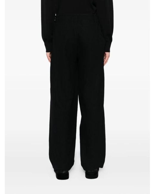 DEVOA Black Pleated-Panel Trousers for men