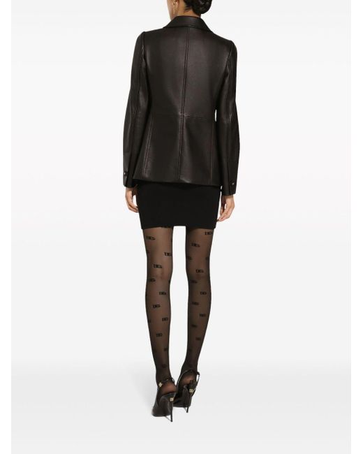 Veste en tweed à boutons embossés Dolce & Gabbana en coloris Black