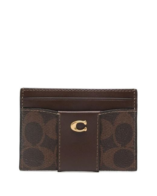 Signature Canvas card holder COACH de color Brown