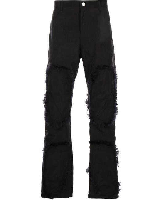 Pantalones slim con detalle de flecos KANGHYUK de hombre de color Black