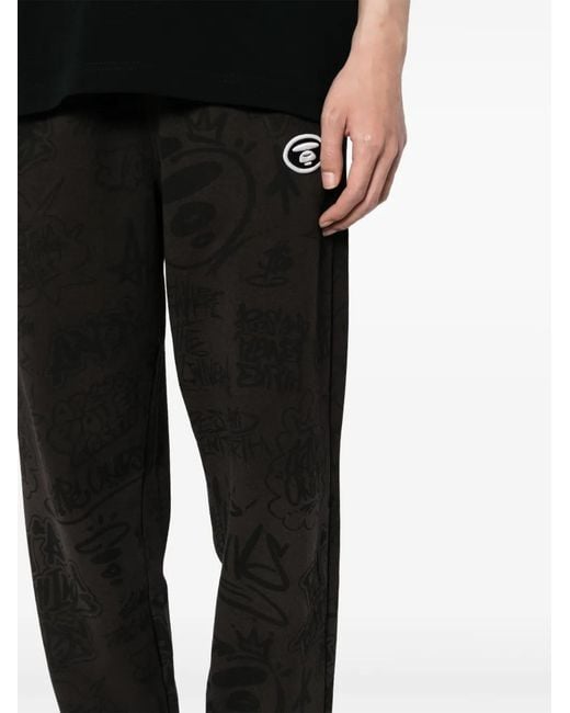 Aape By A Bathing Ape Black Graphic-Print Drawstring Track Pants for men
