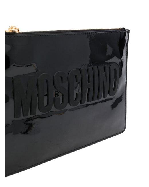 84448213 Pochette Moschino en coloris Noir Femme Sacs Pochettes et sacs de soirée 
