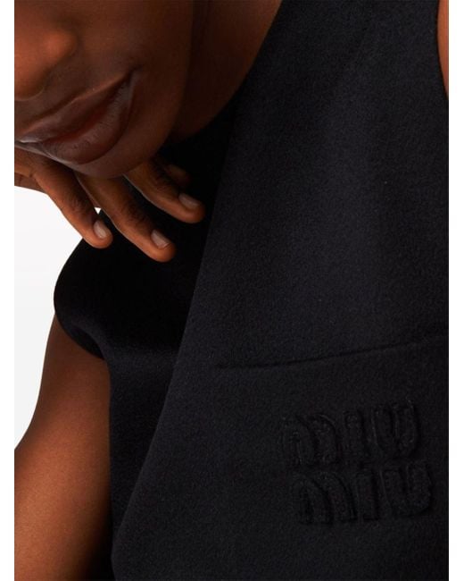 Robe courte en laine à design sans manches Miu Miu en coloris Black