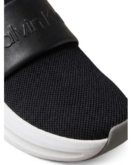 Calvin Klein White Calvin Klein Dark Slip-On Runner Trainers