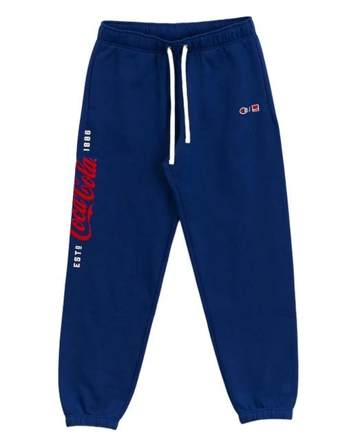 メンズ Champion X Coca-cola ロゴ トラックパンツ Blue