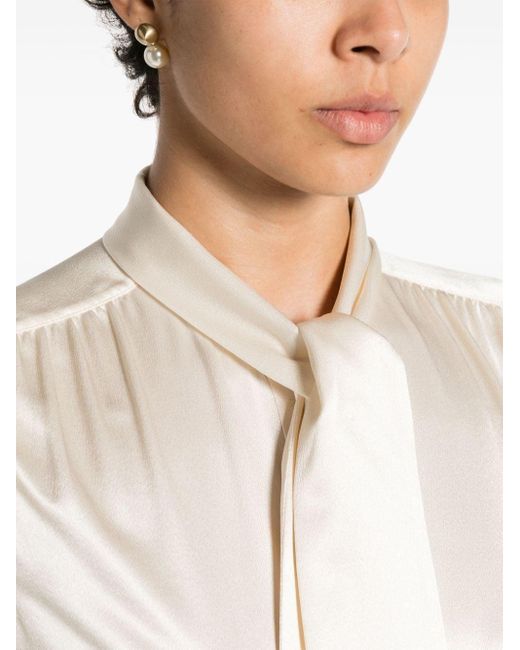 Blusa con cuello con lazo Saint Laurent de color Natural