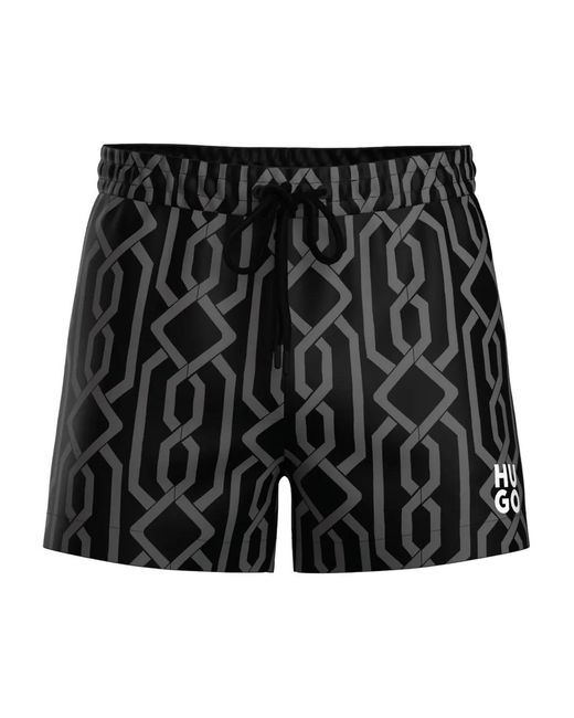 HUGO Black Geometric-Pattern Swim Shorts for men