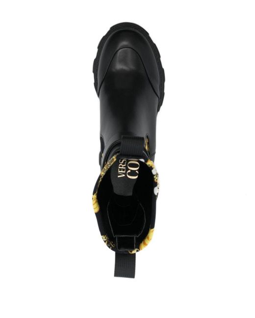 Stivali Sophie 85mm con fibbia decorativa di Versace in Black