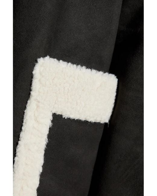 Abrigo Reversible Munthe de color Black