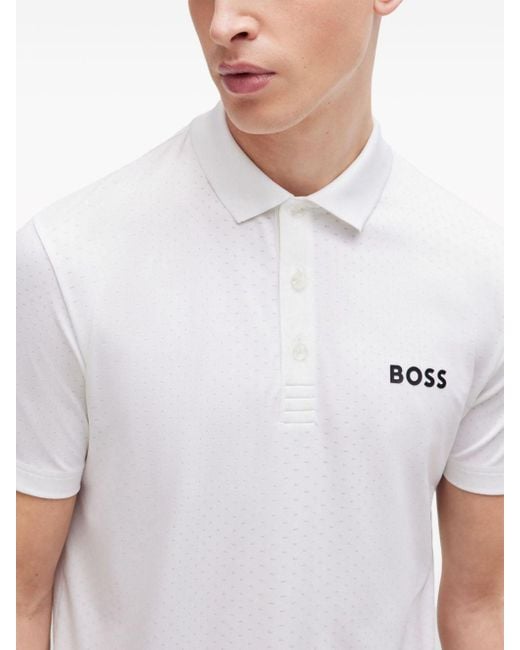 Polo con logo jacquard di Boss in White da Uomo