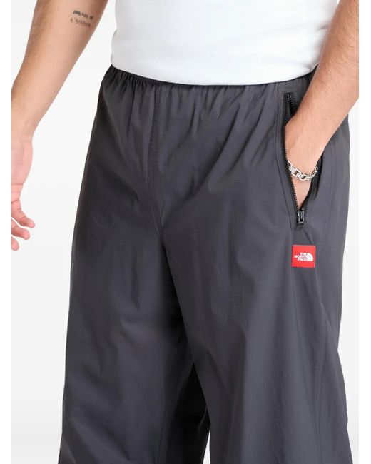 The North Face TNF Red Box Packable Wind Hose in Gray für Herren