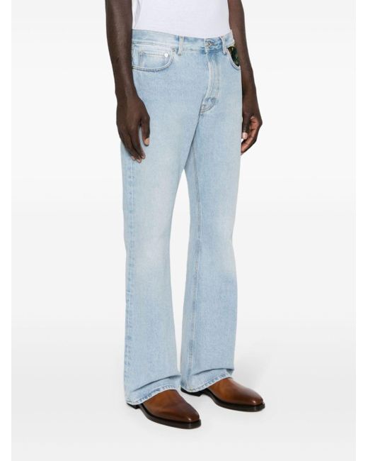 Jeans svasati a vita alta con cut-out di Séfr in Blue da Uomo