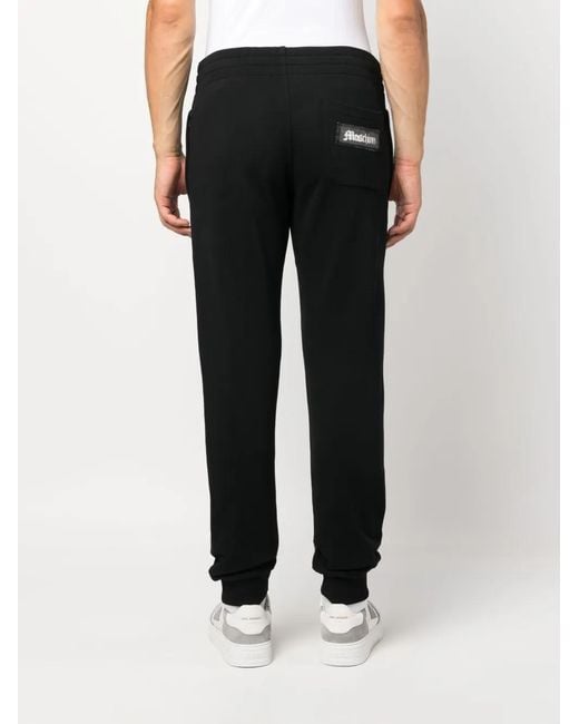 Moschino Black Logo-Patch Elasticated Track Pants for men