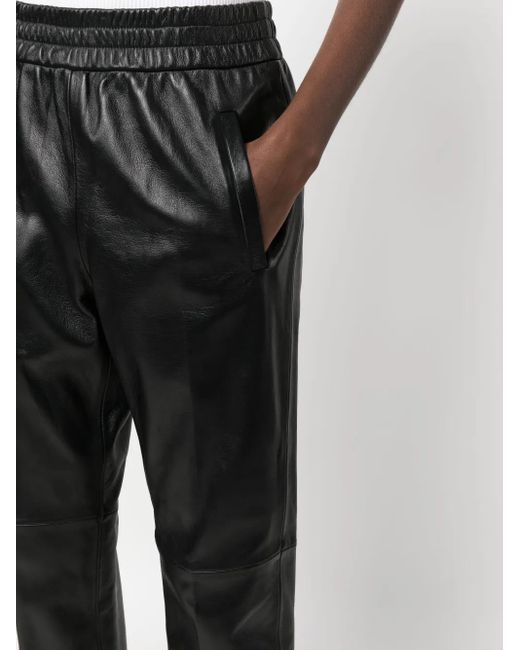 Golden Goose Deluxe Brand Black Leather Pants With Stretch Waistband And Zippers On Hem For