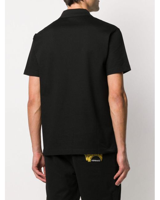 Versace Baumwolle Poloshirt mit Logo-Stickerei in Schwarz für Herren - Lyst