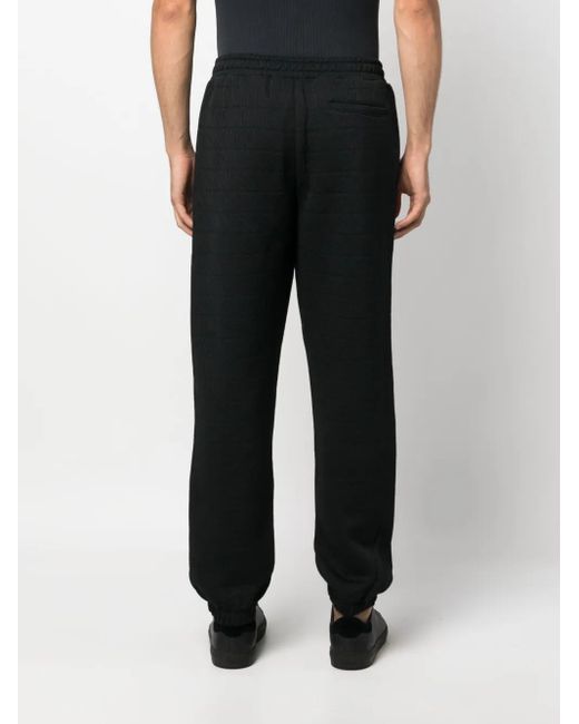 Moschino Black Logo-Pattern Elasticated-Waistband Track Pants for men