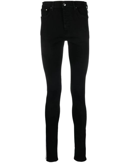 Amiri Black M.A. Track Skinny Jeans for men
