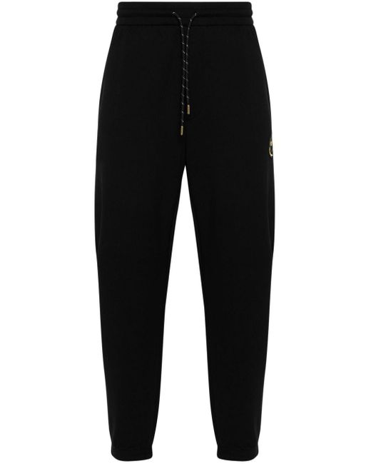 Pantalones con parche del logo Emporio Armani de hombre de color Black