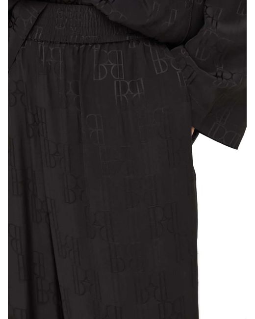 Herskind Black Monogram-Pattern Trousers