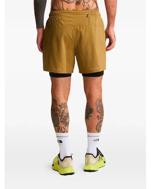 The North Face Yellow Logo Shorts for men