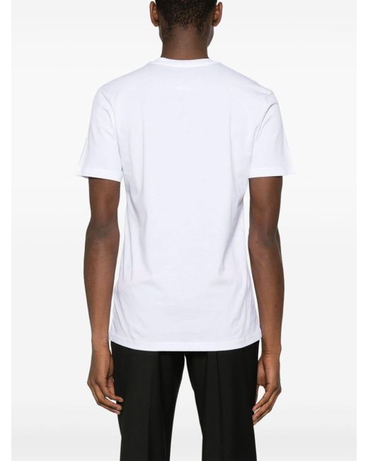 T-shirt en coton à imprimé graphique Moschino pour homme en coloris White