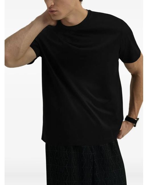 T-Shirt Girocollo A Maniche Corte di Domaine Des Artistes in Black da Uomo