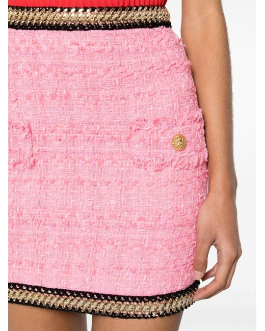 Minifalda de. tweed con cadena Balmain de color Pink