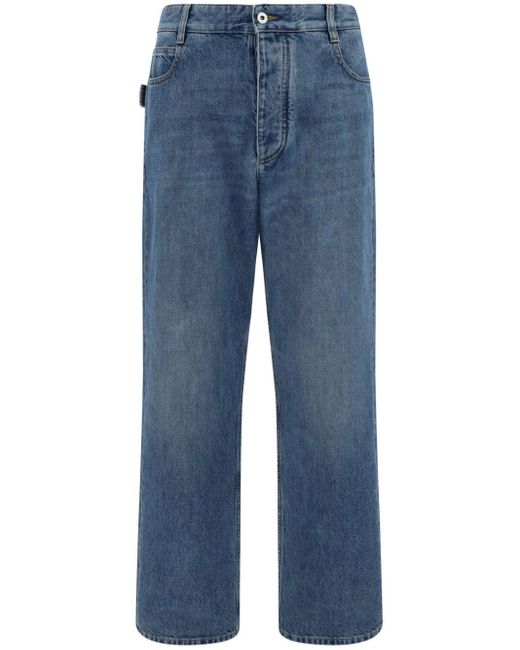 Jeans a gamba ampia con applicazione di Bottega Veneta in Blue da Uomo