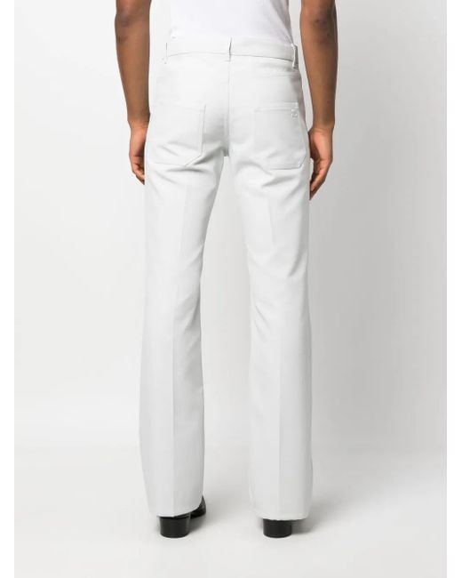Pantalones rectos con parche del logo Courreges de hombre de color White