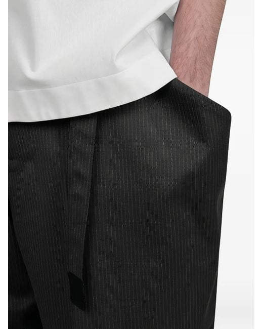 Sacai Black Pinstripe Wool Trousers for men