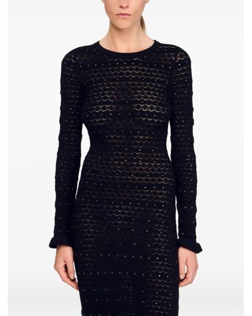 Vestido largo con apliques de strass Sandro de color Black