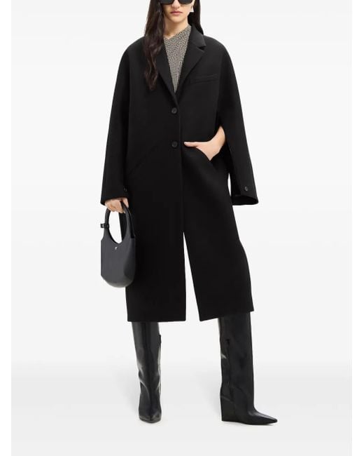 Courreges Black Cocoon Logo-Appliqué Coat