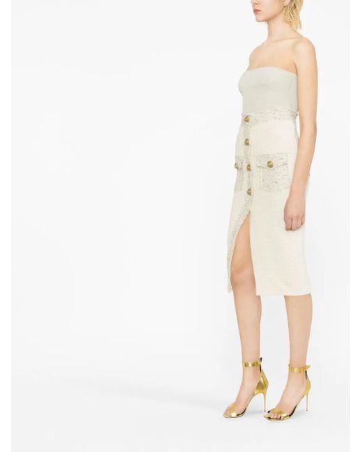 Falda de tubo con botones Balmain de color Natural