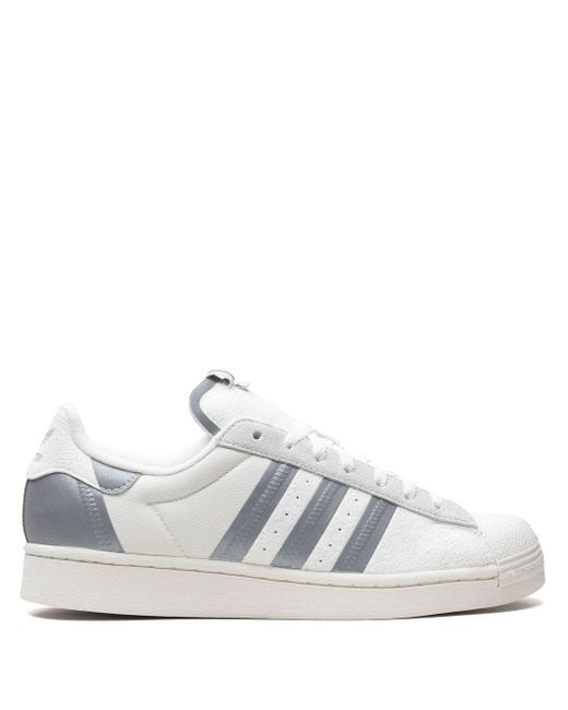 Superstar metallic white discount & silver trainers