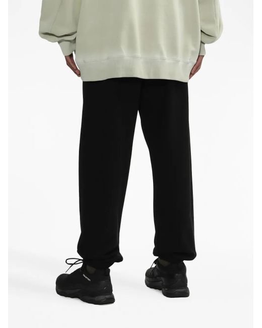 we11done Black Logo-Print Cotton Track Trousers for men