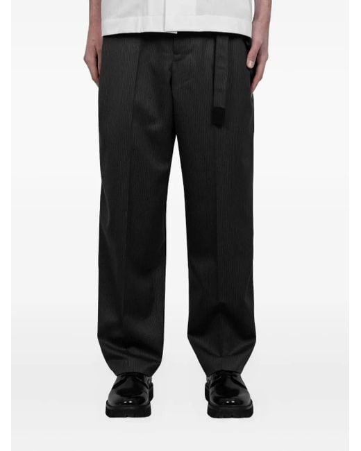 Sacai Black Pinstripe Wool Trousers for men