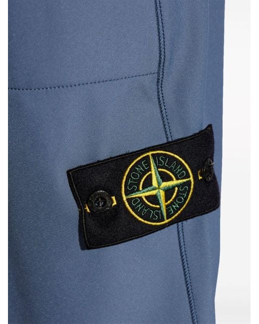 Pantaloni sportivi con applicazione Compass di Stone Island in Blue da Uomo