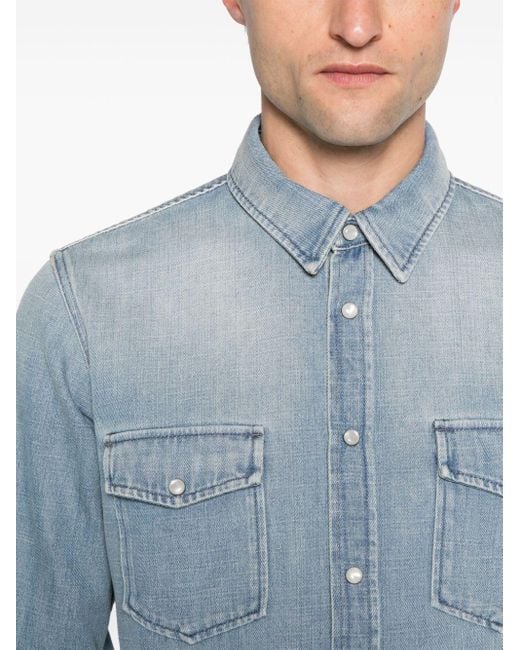Camisa vaquera con apliques de presión Saint Laurent de hombre de color Blue