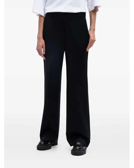The Row Black Pleated Wide-Leg Trousers