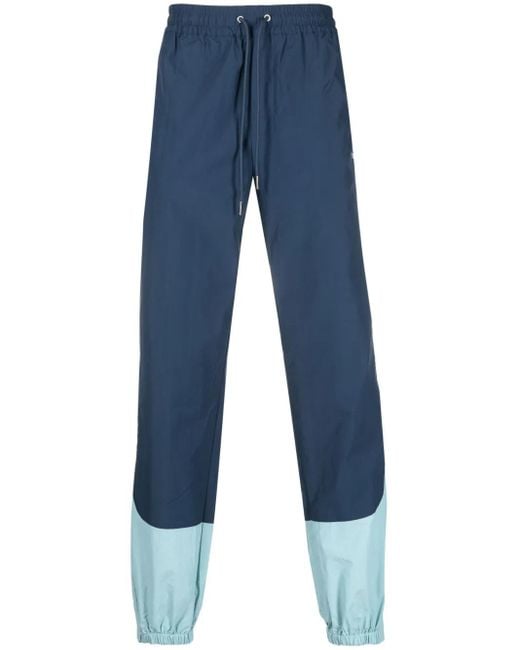 Pantalon De Jogging À Empiècements Arte' pour homme en coloris Blue