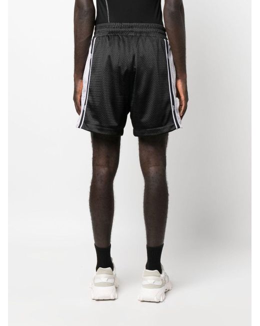 Short de sport perforé à bande logo Fendi pour homme en coloris Black