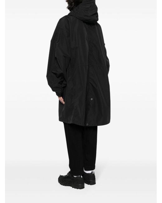 Drop-shoulder hooded parka coat di Junya Watanabe in Black da Uomo