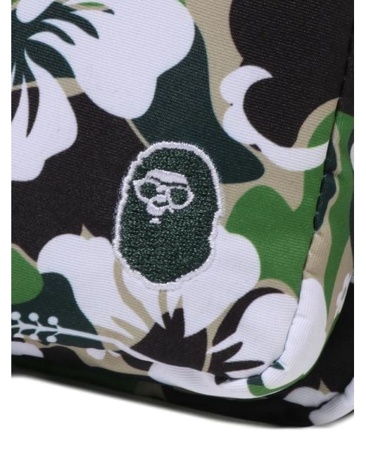 A Bathing Ape Black Hibiscus-Print Camouflage Messenger Bag for men