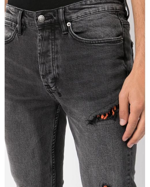 Vaqueros skinny con detalles rasgados Ksubi de hombre de color Gray