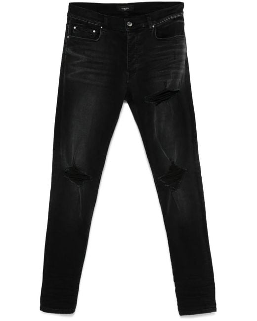Amiri Black Distressed Skinny Jeans for men