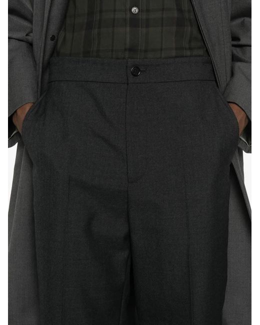 Gucci Black Pressed-Crease Trousers for men