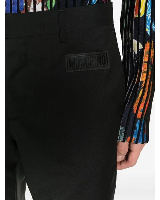 Moschino Black Rubberised-Logo Tailored Trousers for men