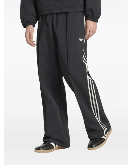 Adidas Blue Britcore Side-Stripe Track Pants for men