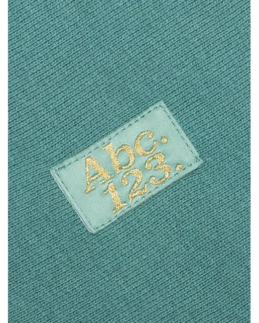 Advisory Board Crystals Green Logo-Patch Cuffed Track Pants for men